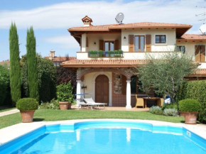 Spacious holiday home in Moniga del Garda with private pool